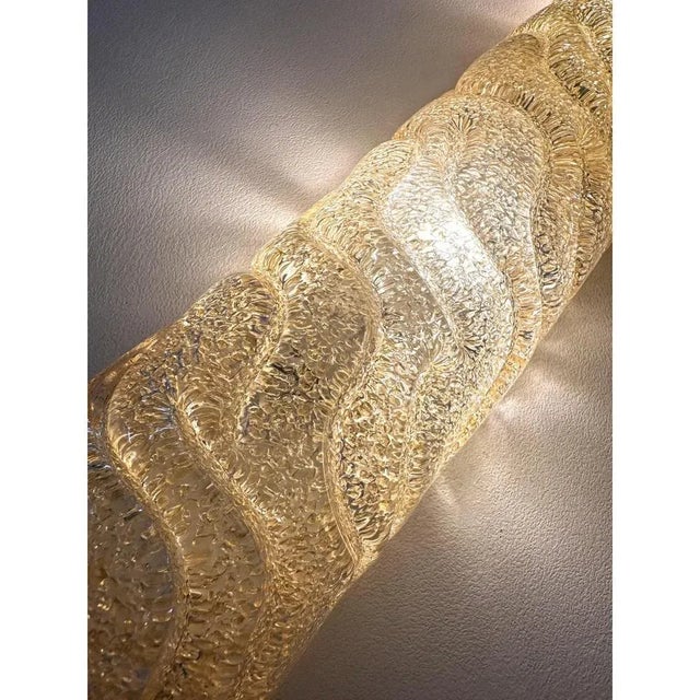 Set of four rectangular wall sconces made in gold "graniglia" of murano glass. made with a traditional murano glass slab...