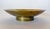 Large Micro scalloped edge brass pedestal bowl for Chase, c.1930s, USA. The solid patinated brass Art Deco bowl features a...