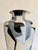 Vintage ceramic pottery vessel or floor vase. A graphic, post modern/Art Deco pattern mixture of black, grays, white and...