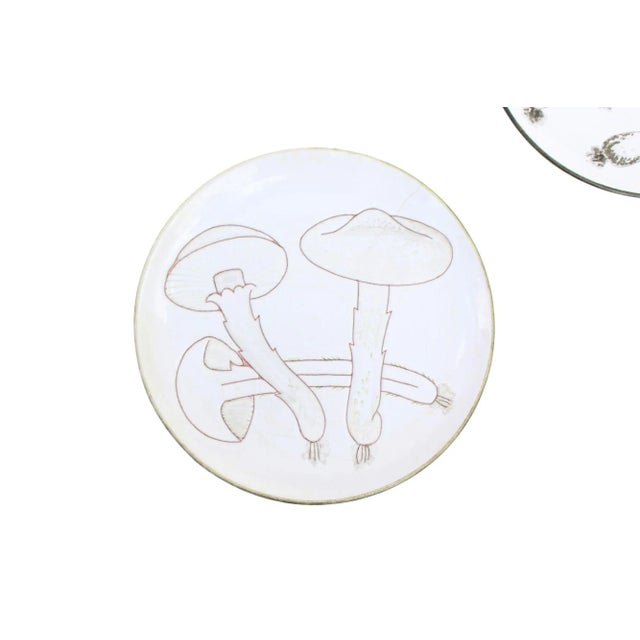 Italy, 1960s Pair of Italian made mushroom plates. Beautifully drawn mushrooms with incised decoration, both in variations...