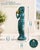 A graceful 32-inch Greco-Roman style garden maiden sculpture, crafted from solid concrete and finished in a blue-green...