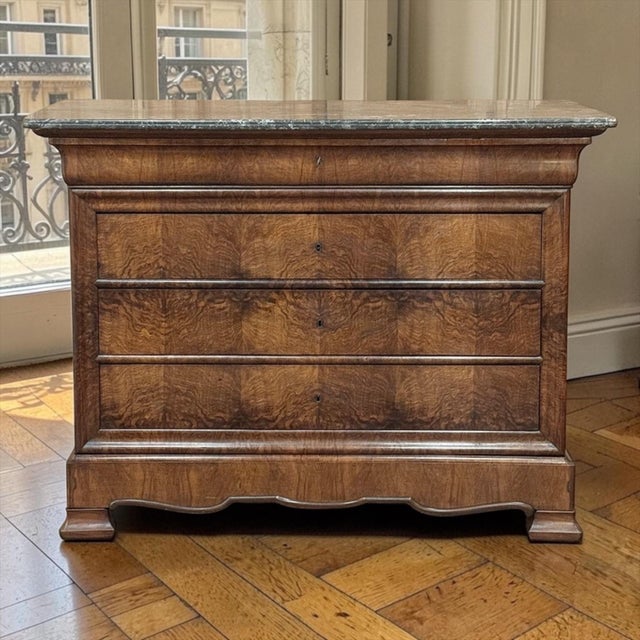 19th Century French Louis Philippe Marble Top Commode by Georges Guerin of Paris is a well-proportioned design, crafted in...