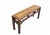 This antique Chinese altar bench showcases a blend of traditional craftsmanship with its decorative hand-carved spandrels....