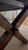 The table features a bold, deep-toned finish that emphasizes the rich grain of its premium oak plywood top. What truly...
