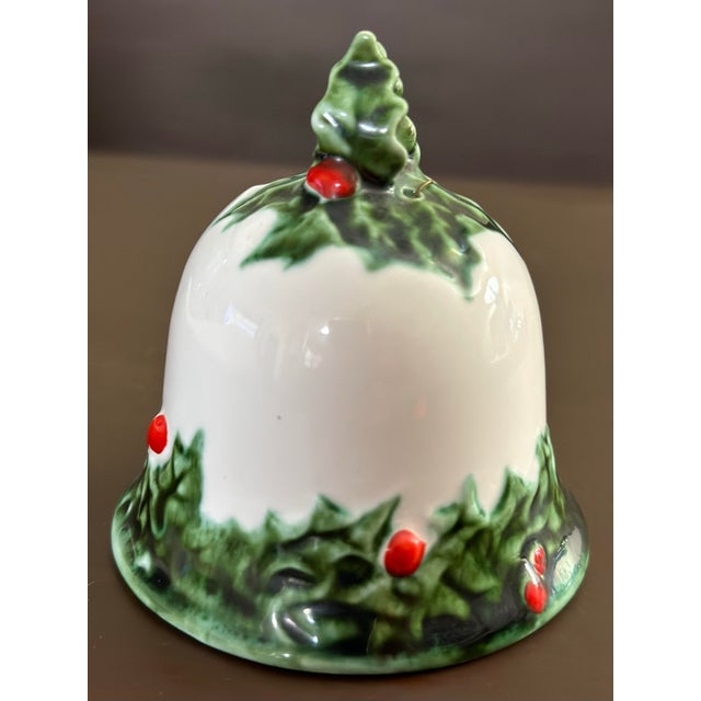 Pretty holly berry Christmas bell ornament. 3” x 3” x 3 1/2”.
