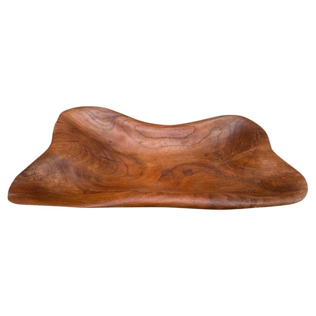 Minimalist teak platter or bowl hand carved from a single piece of reclaimed teak wood. Finished with a natural oil...