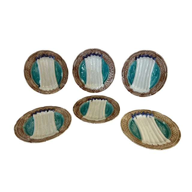 Set of 6 slip plates from the Moulin des Loups factory located in the North of France. These plates have a basketwork rim....