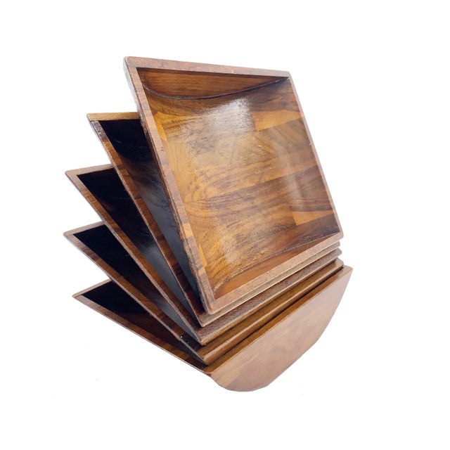 This set of 5 handcrafted solid wooden bowls are ultra mid-century modern in style. They feature unique angled rectangular...