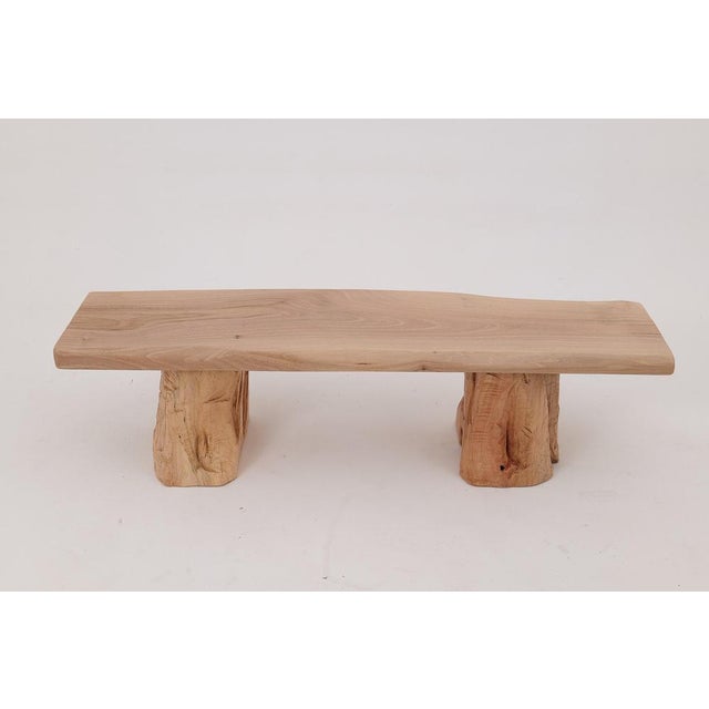 Embrace the essence of wabi-sabi with our walnut bench, meticulously crafted from a walnut wood. This bench is a...