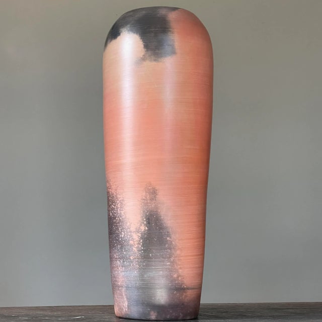 Vintage Studio Salmon Colored Porcelain Raku Vase Signed By Albert Green. Tall porcelain vase with puffs of blackened...
