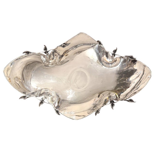 An impressive matched pair of Turkish sterling silver centerpiece bowls by Damar, dating to the late 20th century. Each...
