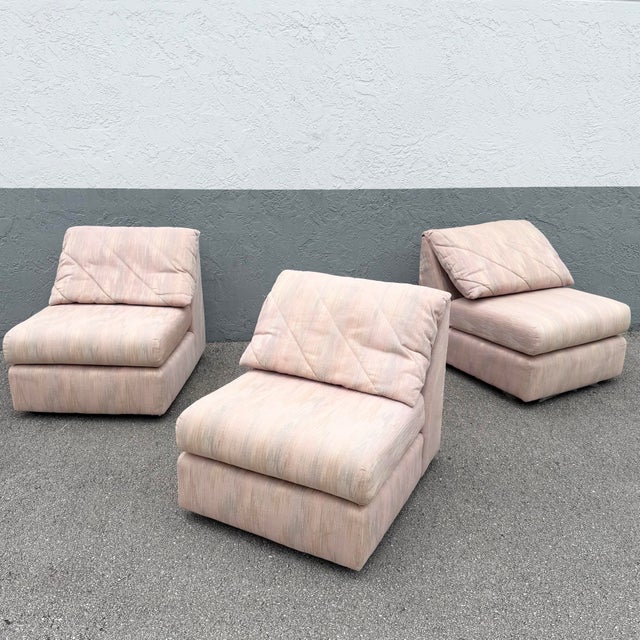 This postmodern modular seating group features three individual lounge chair sections upholstered in an original woven...