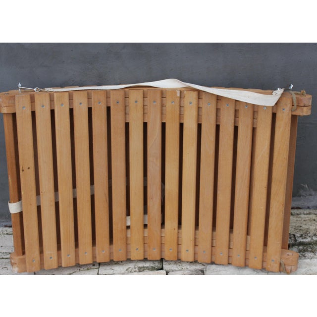 This elegant folding sun lounger embodies a refined balance between functionality and sculptural form. Crafted from solid...