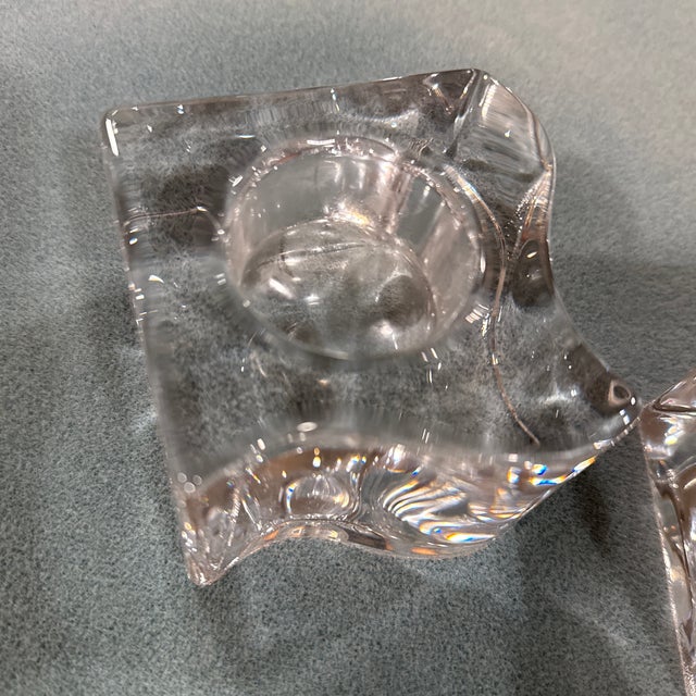 Pre owned pair of orrefors crystal candleholders puzzle