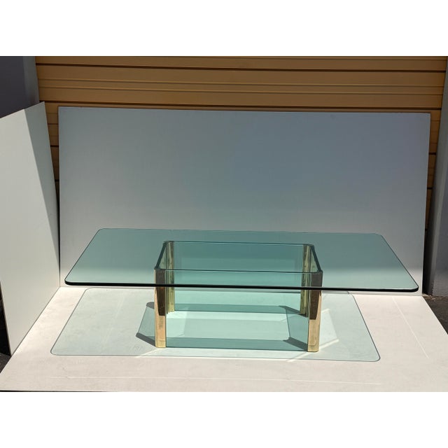 Leon Rosen for Pace Collection very large glass and brass coffee table. Glass top is 3/4” thick and 36”x72” Base is 18”...