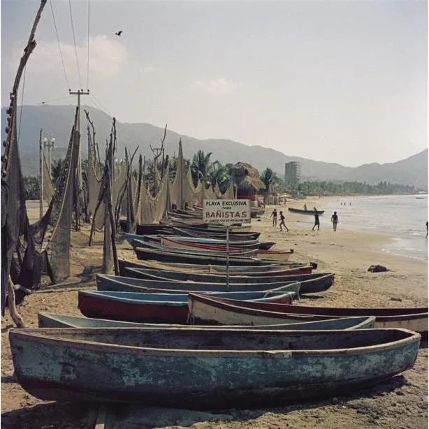 Fishing Boats 1952 Fishing nets and boats on the shore in Mexico, 1952. Slim Aarons Slim Aarons was one of the twentieth...