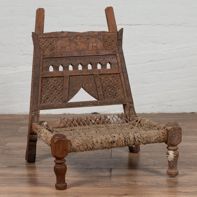 Rustic Indian Low Wooden Chair With Rope Seat and Weathered Appearance For Sale - Image 12 of 16