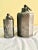 Lot 88 Pair of antique pewter tea containers. Small 3”w x 7”h. Large 4.75”w x 9.5”h. Perfect to use as displays pieces....