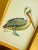 This striking pelican is hand-painted by master artists using acrylic paints and natural pigments, with extraordinary...