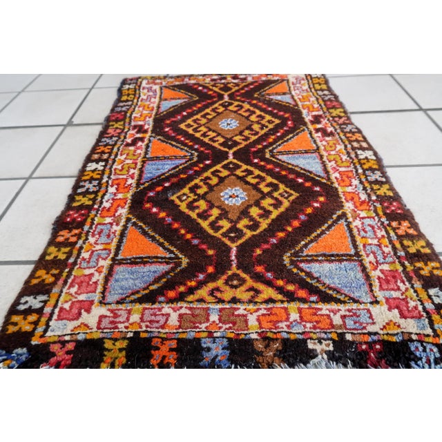 Condition: This rug is in its original good condition, retaining its beauty and charm through the years. Circa: Crafted...