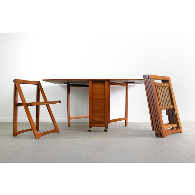Wood 1960s Danish Modern Drop Leaf Hide a Way Table With 4 Folding Chairs - 5 Pieces For Sale - Image 7 of 7