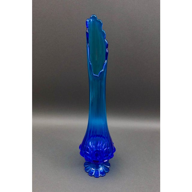 Fenton Valenicia Large MCM Vintage Blue Art Glass Swung Footed Vase. Measures approximately 5 7/8" diameter, 23 1/8" high.