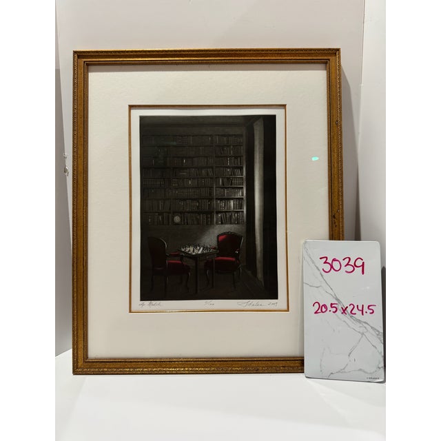Limited edition color etching with aquatint by American artist Lynn Shaler, titled Le Match, depicting an intimate library...