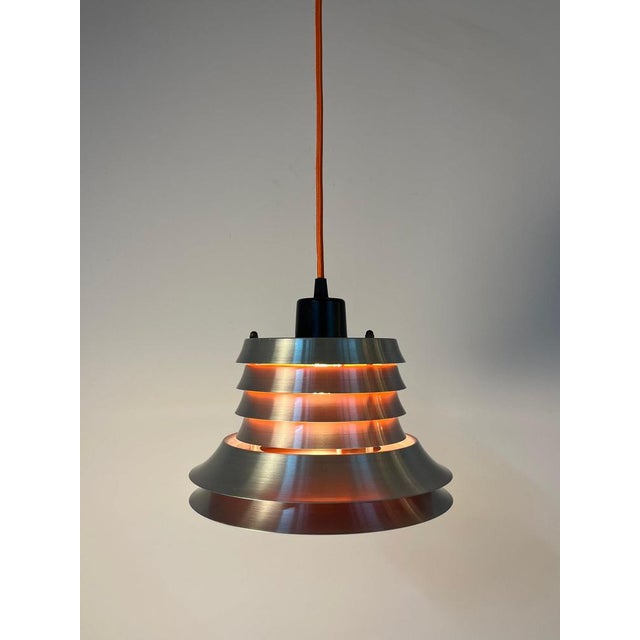This silver and orange louvered lamp by Carl Thore is a spectacular original example of Scandinavian mid-century design...