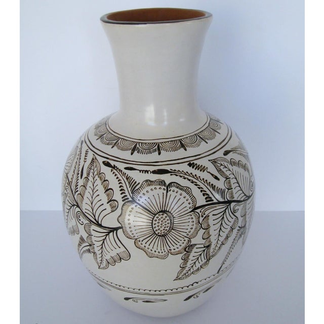 Vintage ceramic vase by Michoacan artist Bernardina Rivera. The base is a cream satin glaze decorated with a hand-painted...