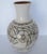 Vintage ceramic vase by Michoacan artist Bernardina Rivera. The base is a cream satin glaze decorated with a hand-painted...