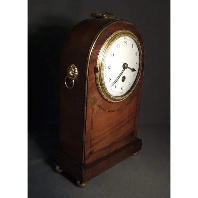 Antique handsome Edwardian mahogany mantle carriage clock in the Regency taste. Great details including lion's head ring...