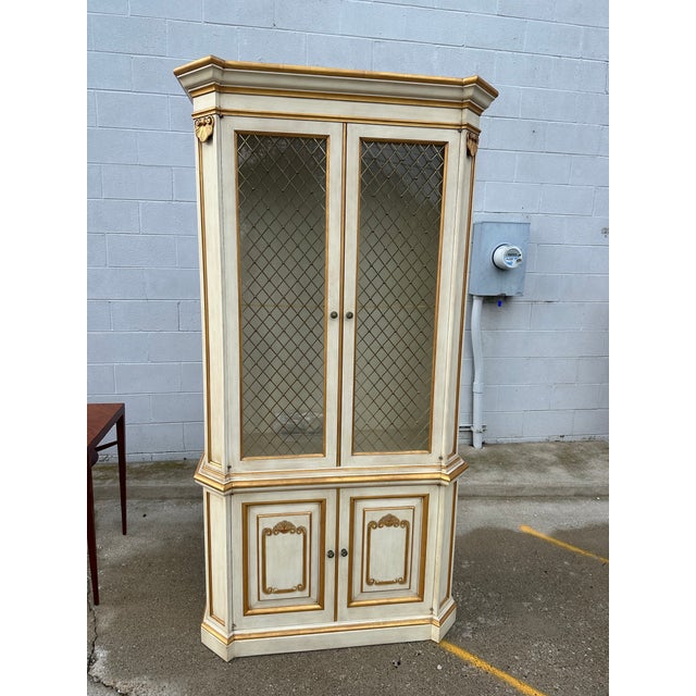 Exquisite John Widdicomb Country French China closet/Vitrine. Expertly crafted in the USA with a creamy painted finish,...