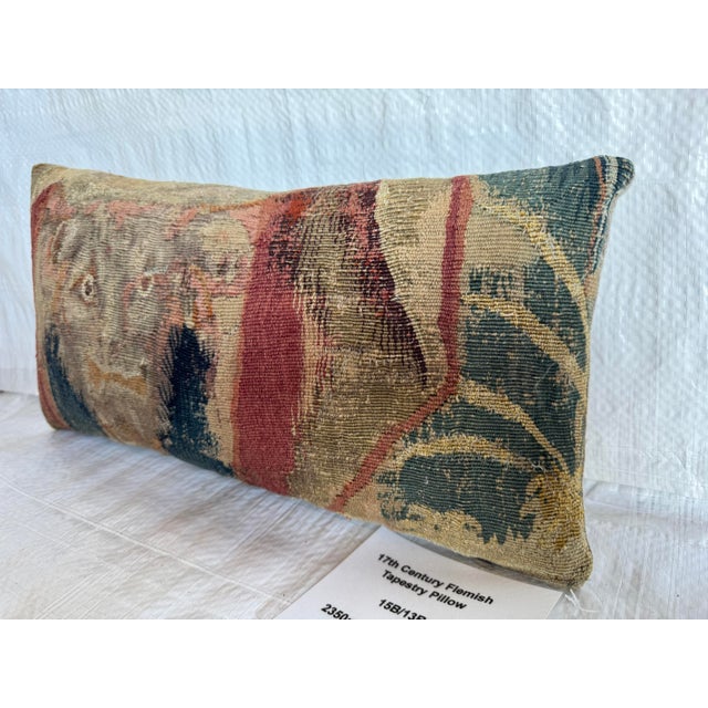 This decorative pillow was created from an authentic 17th century Flemish tapestry fragment, handwoven in wool and...