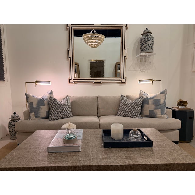 This sophisticated standard sofa showcases a clean-lined contemporary transitional style with a relaxed yet refined...