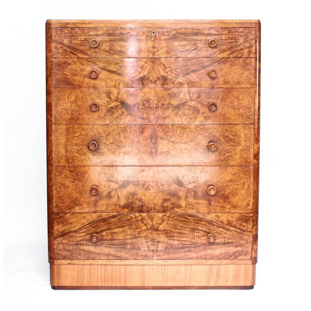 An Art Deco, walnut-veneered six-drawer chest of drawers. Original walnut handles and mahogany lined drawers. Dimensions:...
