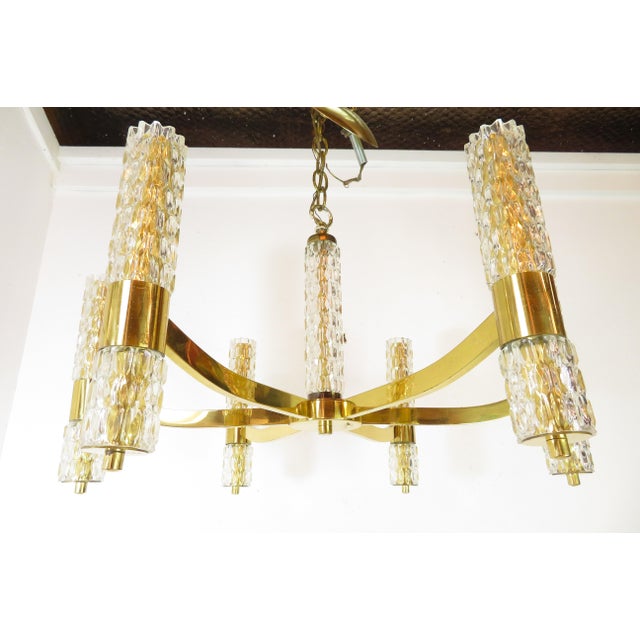 Gorgeous vintage, mid century modern, brass and glass 6 light hanging chandelier ceiling lamp. This piece is currently set...