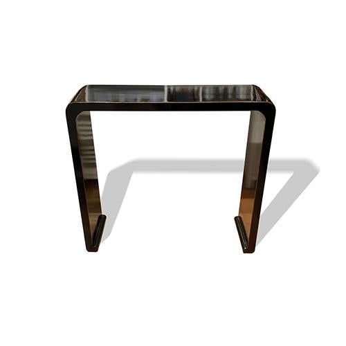 Waterfall Console Table is made out of elm wood. It has tiny little gold trim around the edging. It is nice to place at...