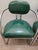 Fabulous Streamline Modern cantilever chair comprised of chrome frame and emerald green vinyl faux leather upholstery...