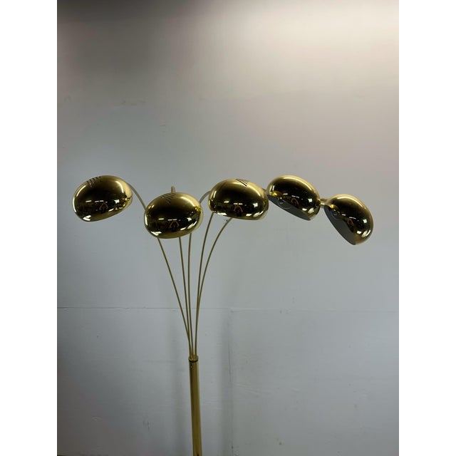 This postmodern floor lamp features five globe design, original brass finish, multi function switch allowing for some or...