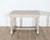 An elegant Swedish Gustavian console table from the first quarter of the 1800s, masterfully crafted in carved pine and...