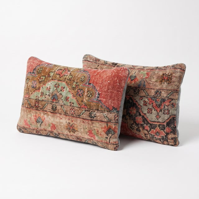 This beautiful 16'' x 24'' pillow cover set was made from authentic Turkish rug pieces. Bright colors of wool adorn the...