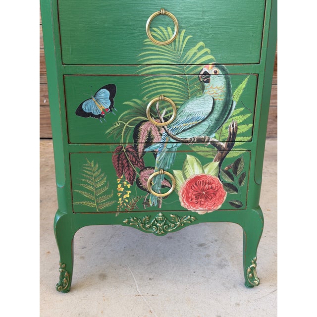 A one-of-a-kind vintage four-drawer lingerie chest transformed into a vibrant tropical statement piece. Finished in a rich...
