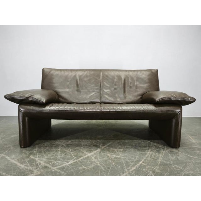 Original two-seat sofa by Jori, manufactured in Belgium during the 1990s. Upholstered in premium thick full-grain leather...