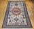 "A striking vintage Persian Ardabil rug from the mid-20th century, this room-size carpet showcases the iconic “signature...