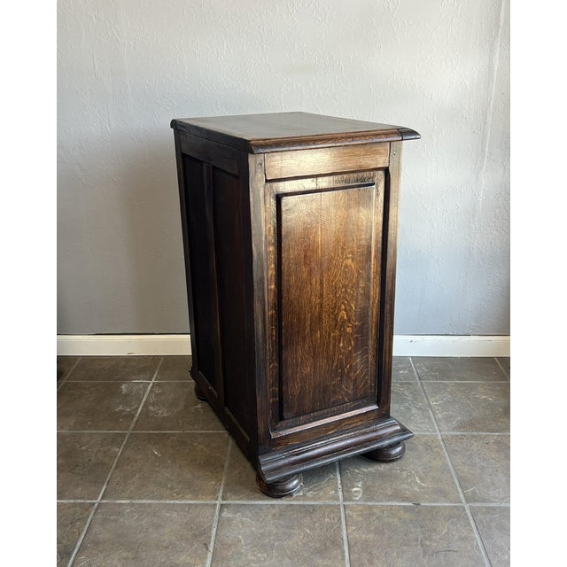 Crafted from solid French oak, this compact cabinet reflects the enduring practicality and understated elegance of...