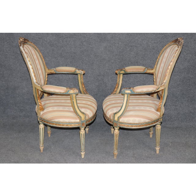 Dimensions: 37.75 inches high x 26.25 inches wide x 25.5 inches deep. Seat Height 17.25 inches Truly outstanding pair of...