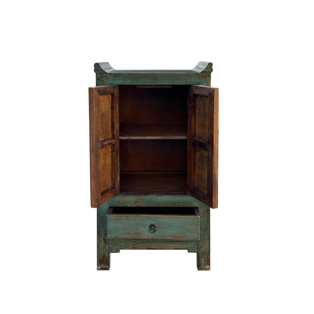 This oriental cabinet is a captivating blend of rustic charm and elegant design. Crafted from solid wood with hand-carved...