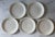 Set of 5 vintage white dinner plates with Shell Edge and incised flower pattern across the face. Made by Syracuse China....