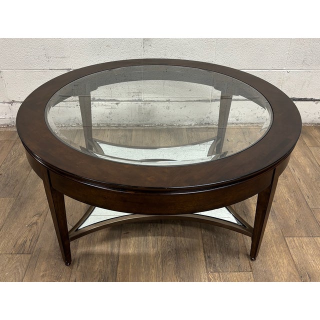 This is a gorgeous vintage Kincaid Elise Aura Amaretto glass top two tiered oval Transitional style coffee table or...