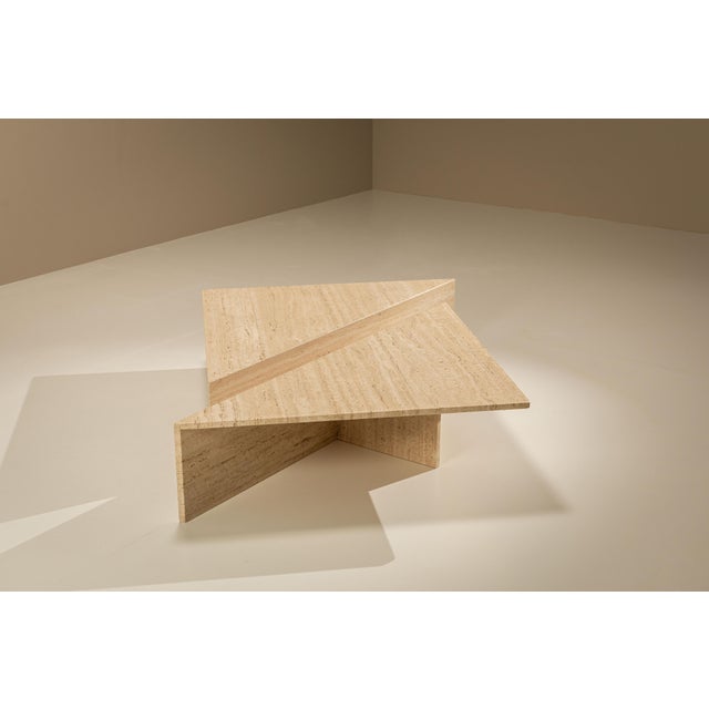 This Italian coffee table from the 1970s adds a sharp contrast in form and light to the interior. The beautiful beige...